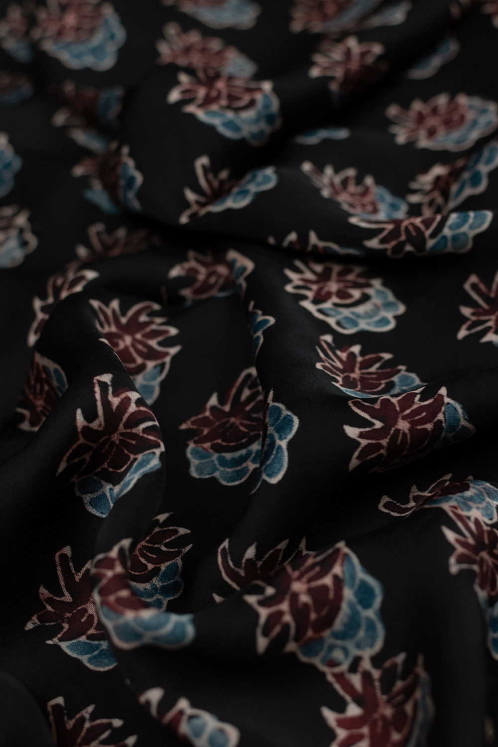 Florets on Black Ajrak Modal Silk Fabric