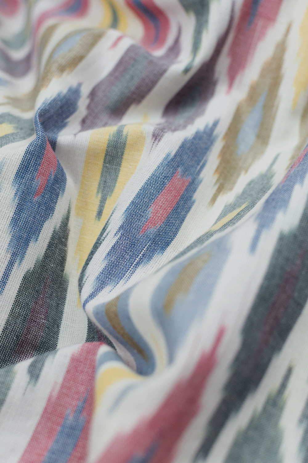 Multi-Color on Cream Ikat Cotton Fabric