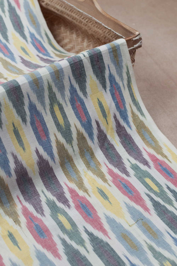 Multi-Color on Cream Ikat Cotton Fabric