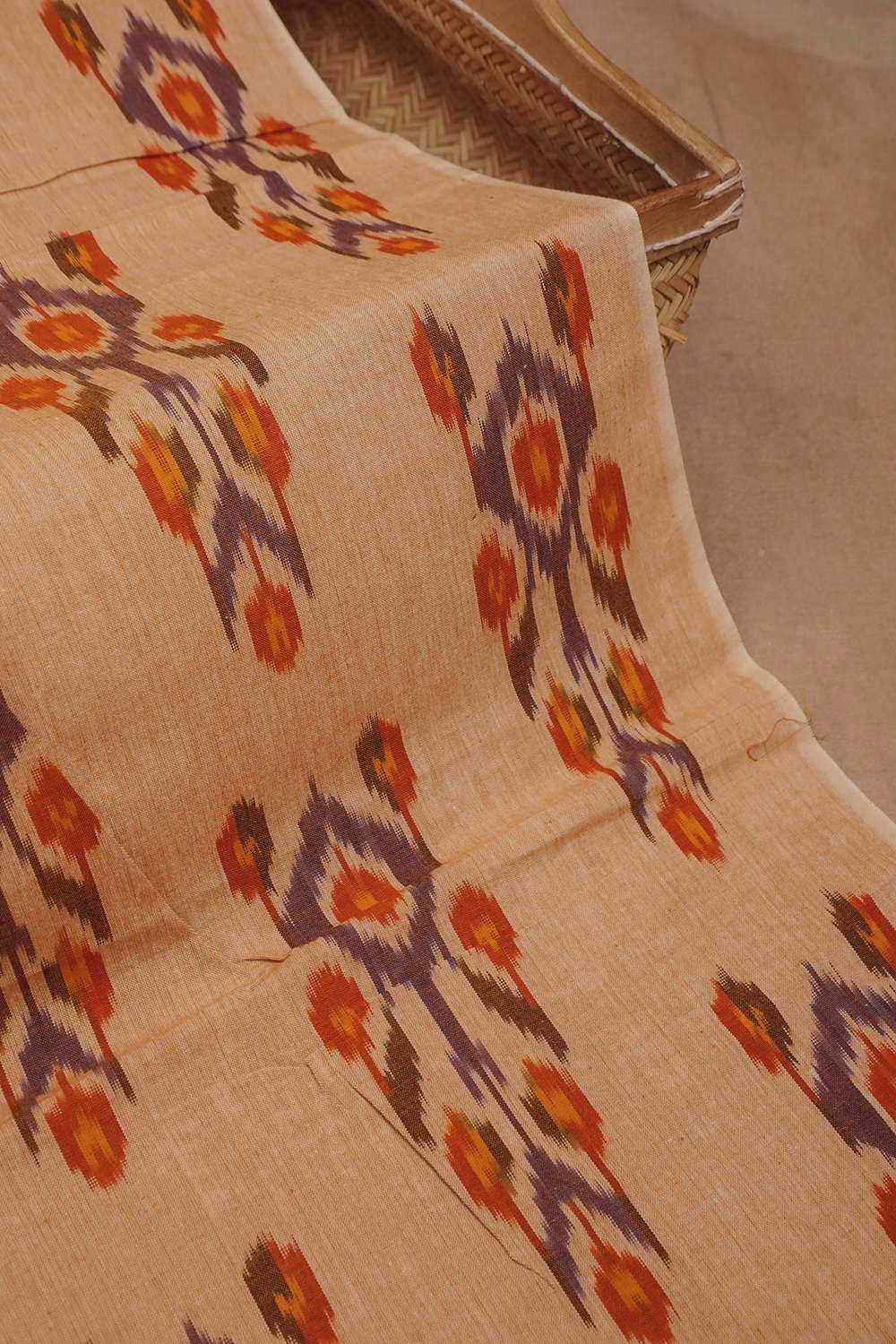 Big Butta on Baby Orange Ikat Cotton Fabric