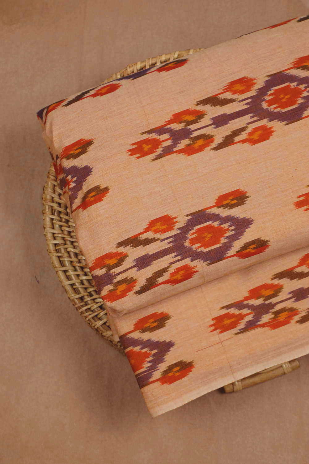 Big Butta on Baby Orange Ikat Cotton Fabric